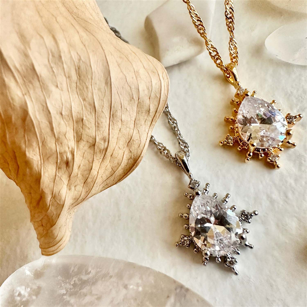 Cindel Teardrop Charm Necklace With Rhinestone Baguettes