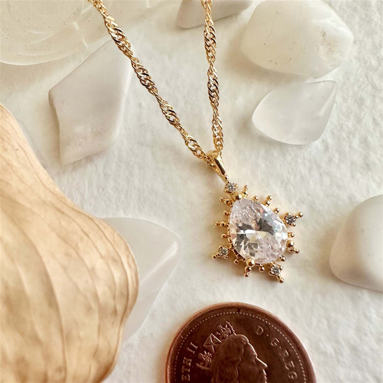 Cindel Teardrop Charm Necklace With Rhinestone Baguettes