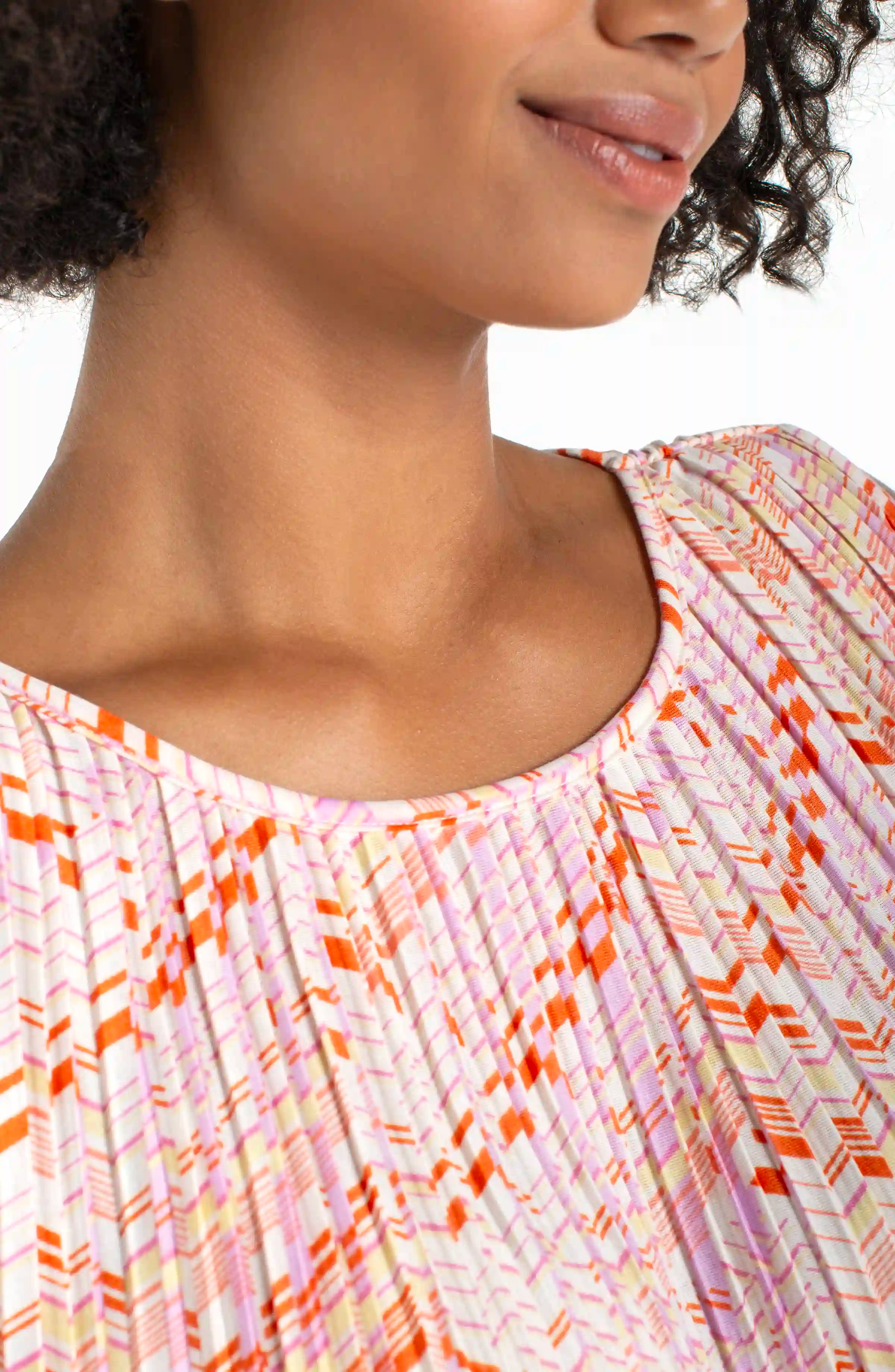 Sleeveless Asymmetric Hem Knit Top