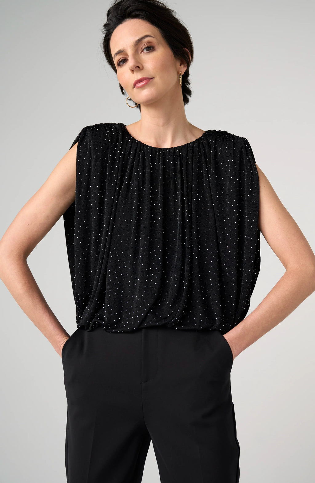 Sleeveless Draped Knit Top With Shoulder Pads