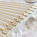 Carrie Mother Of Pearl Inlayed Initial Charm Necklace